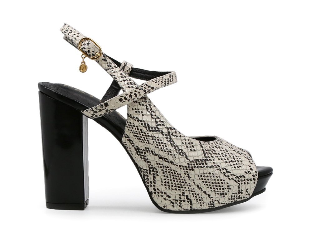 Zapatilla de tacon en cuero blanco