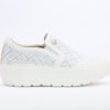 Tenis en cuero blanco